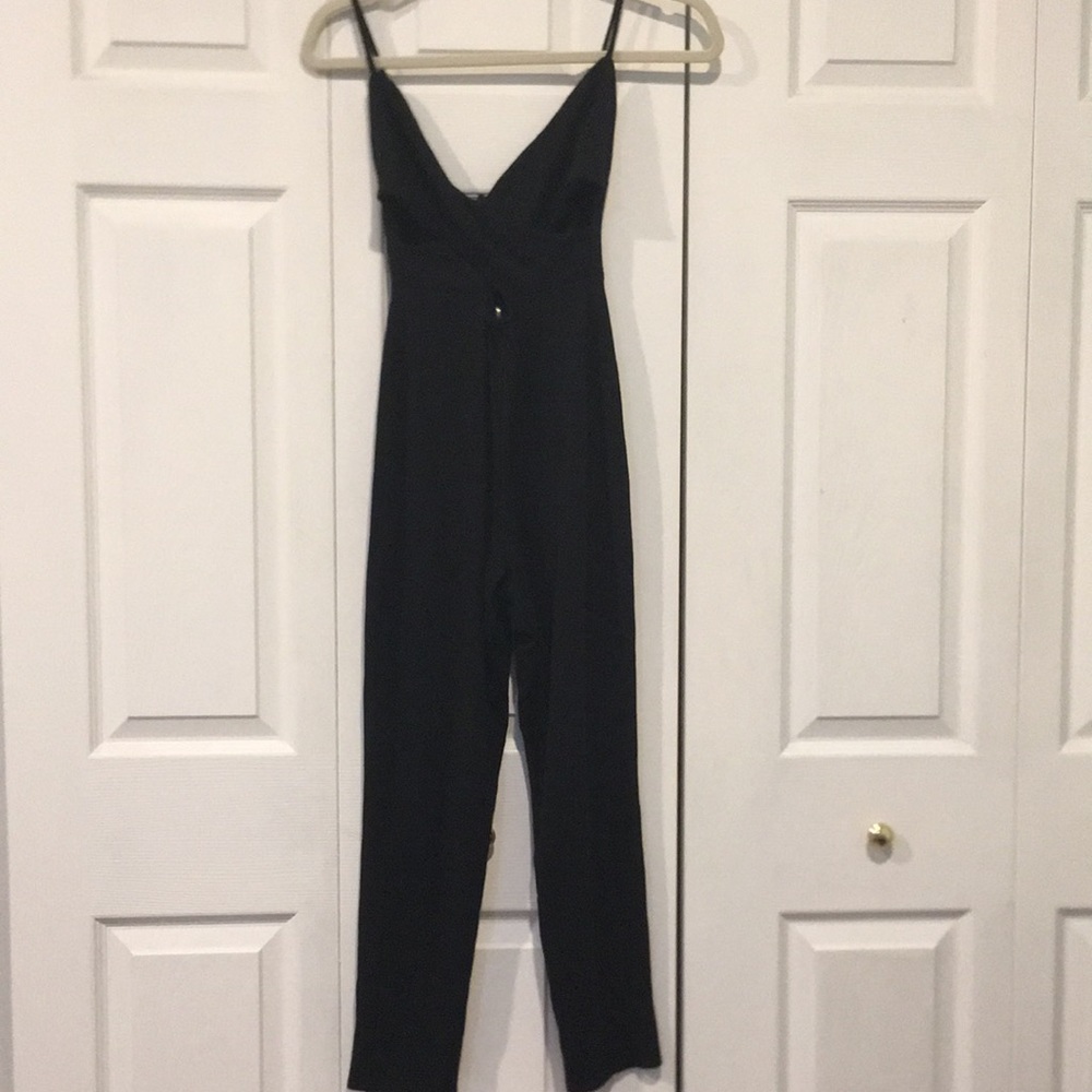⭕️ Rolla Coster Black Romper - Small